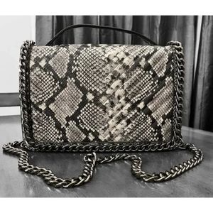 Aldo Greenwald Crossbody Bag Snake Print,used only once ,excellent condition
